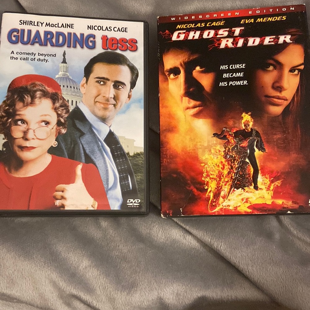 Set of two DVDs, starring Nicolas Cage, Guarding Tess and Ghost Rider